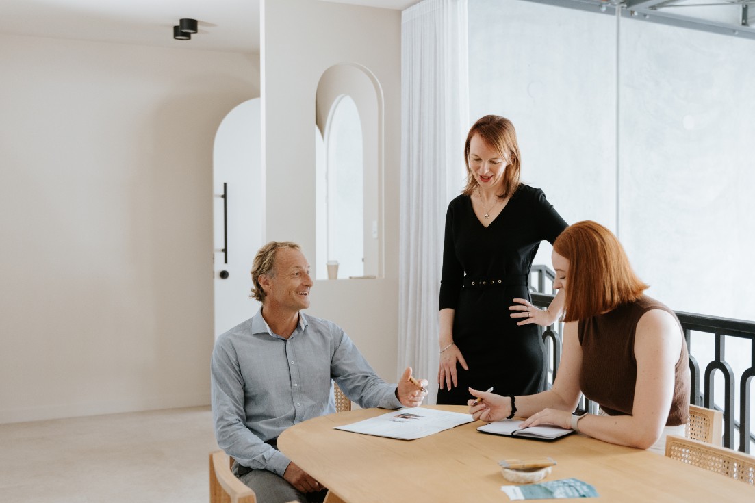 do-i-need-lawyer-to-contest-a-will Three lawyers chatting in bright room