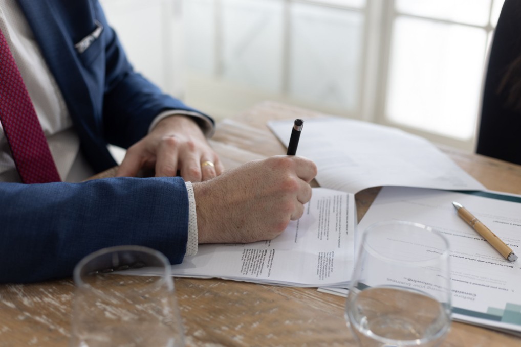 Hand signing contract