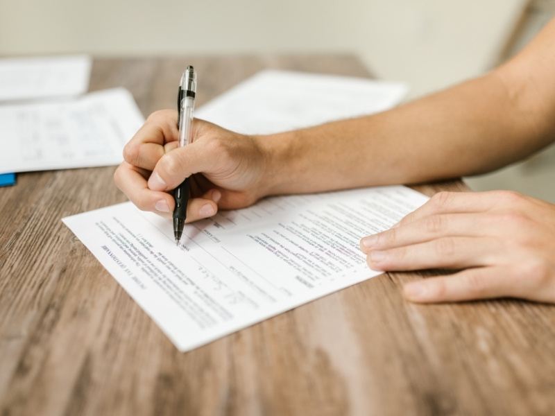 Hand signing contract